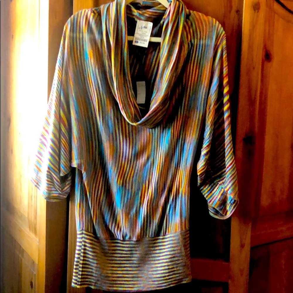 Long 70’s inspired cowl neck top.